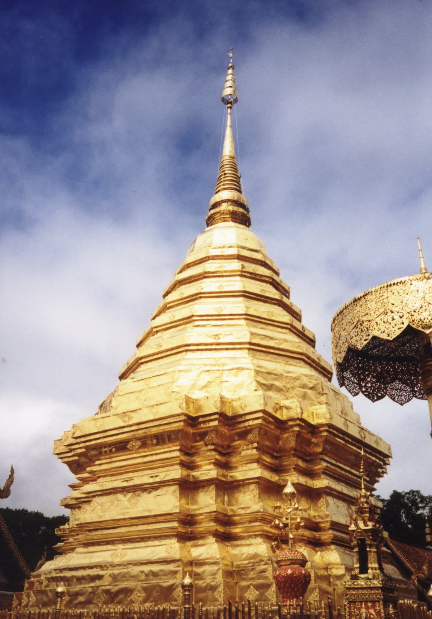 Golden chedi of Doi Suthep against a blue sky