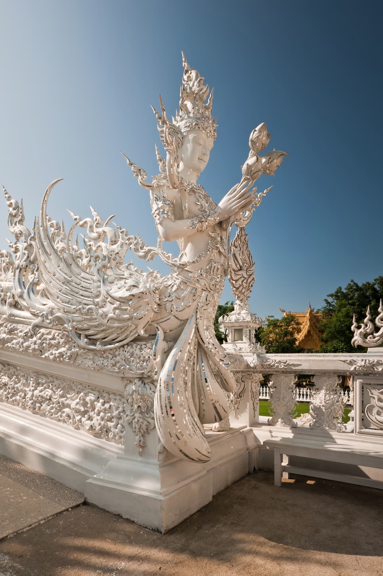 Sculpted white spire of the White Temple against the sky